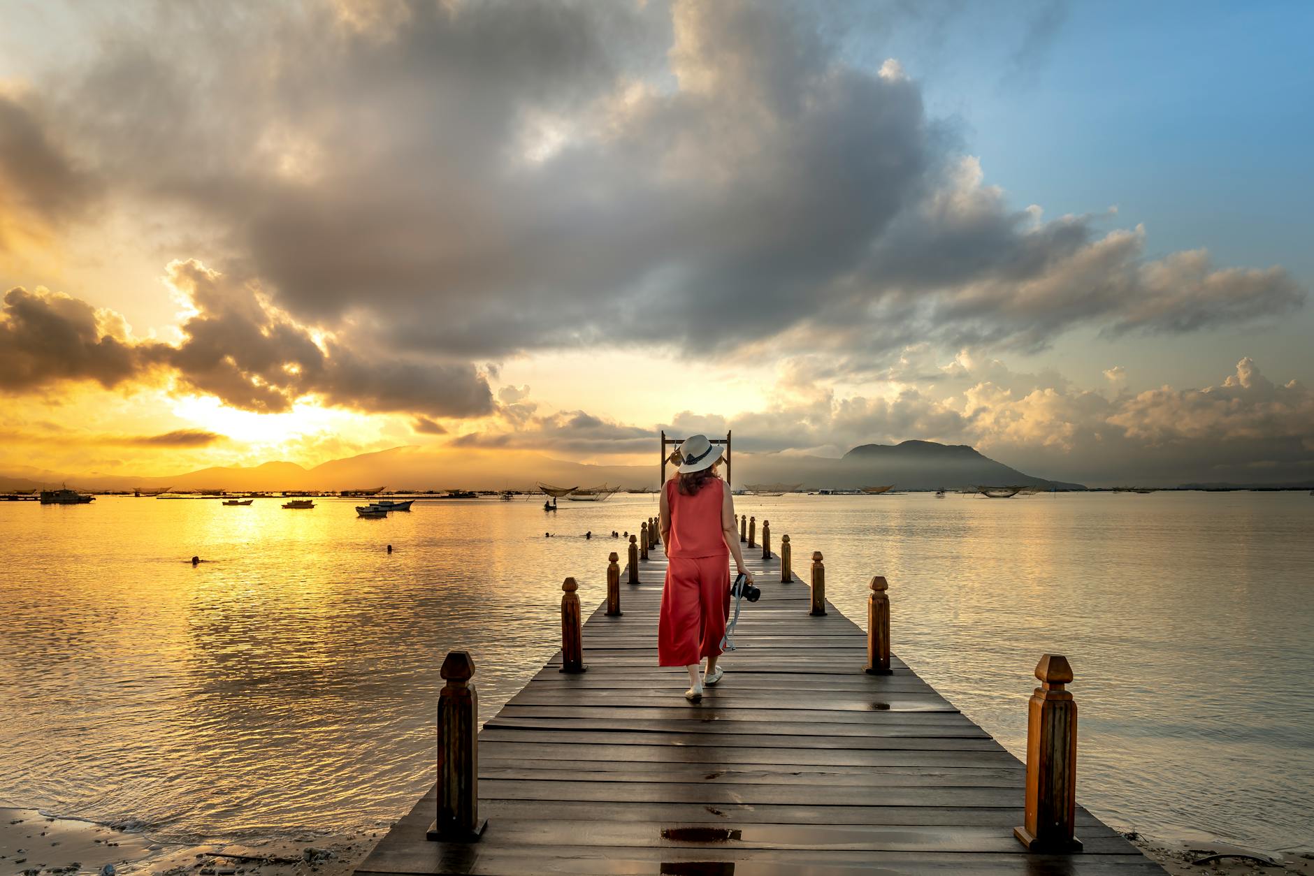 Woman stepping forward with lightness and ease on a bright path representing the natural forward momentum of the 123 angel number