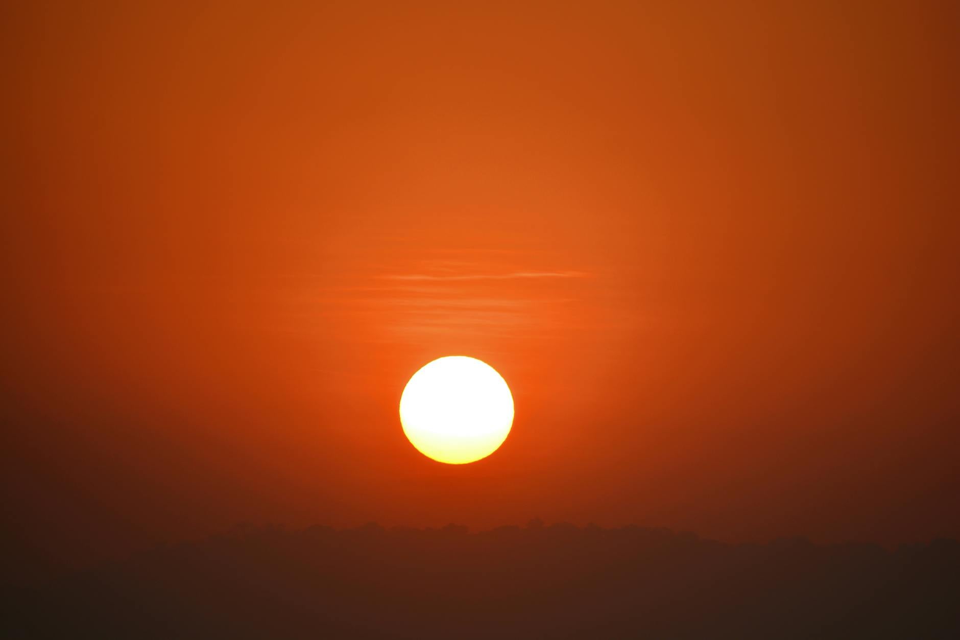 Sunrise over a wide, open landscape — the dawn of the fresh new beginning promised by angel number 1441 after its foundation-rebuilding work