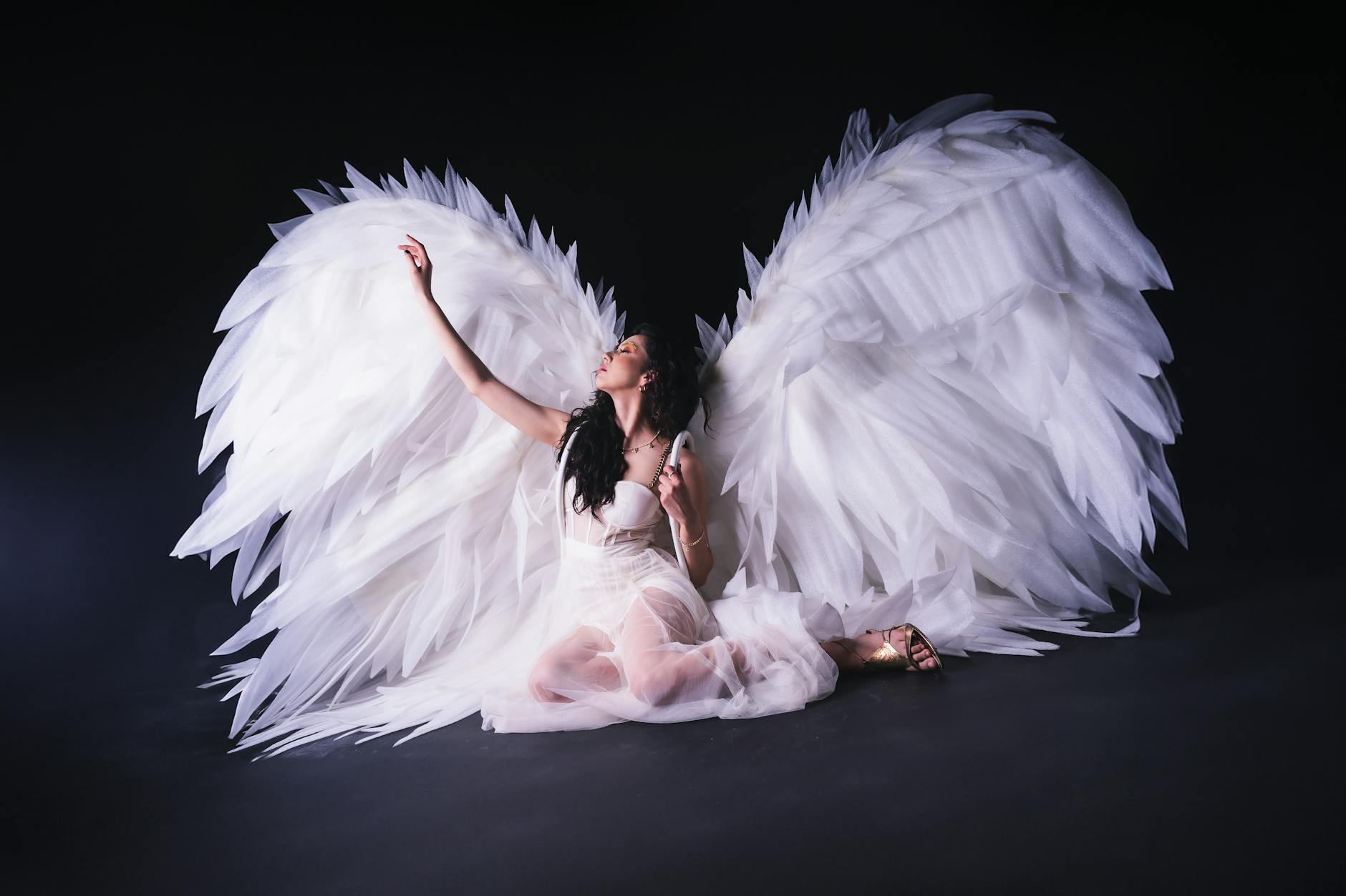 Artist in a studio with creative energy representing the joyful new beginnings of angel number 3131