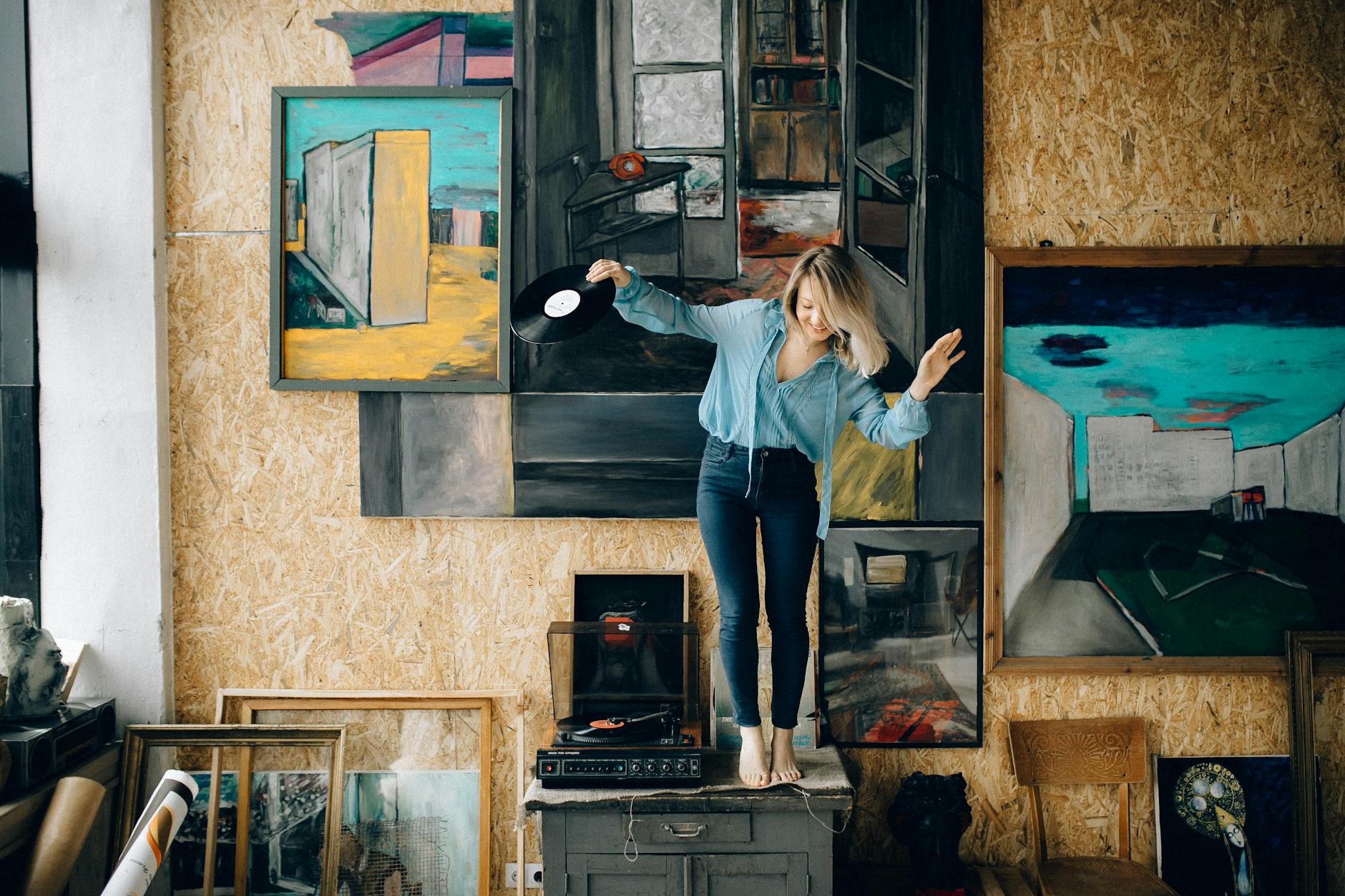 Woman and friend collaborating joyfully on a creative project representing the creative power and trust building together in the 3322 angel number