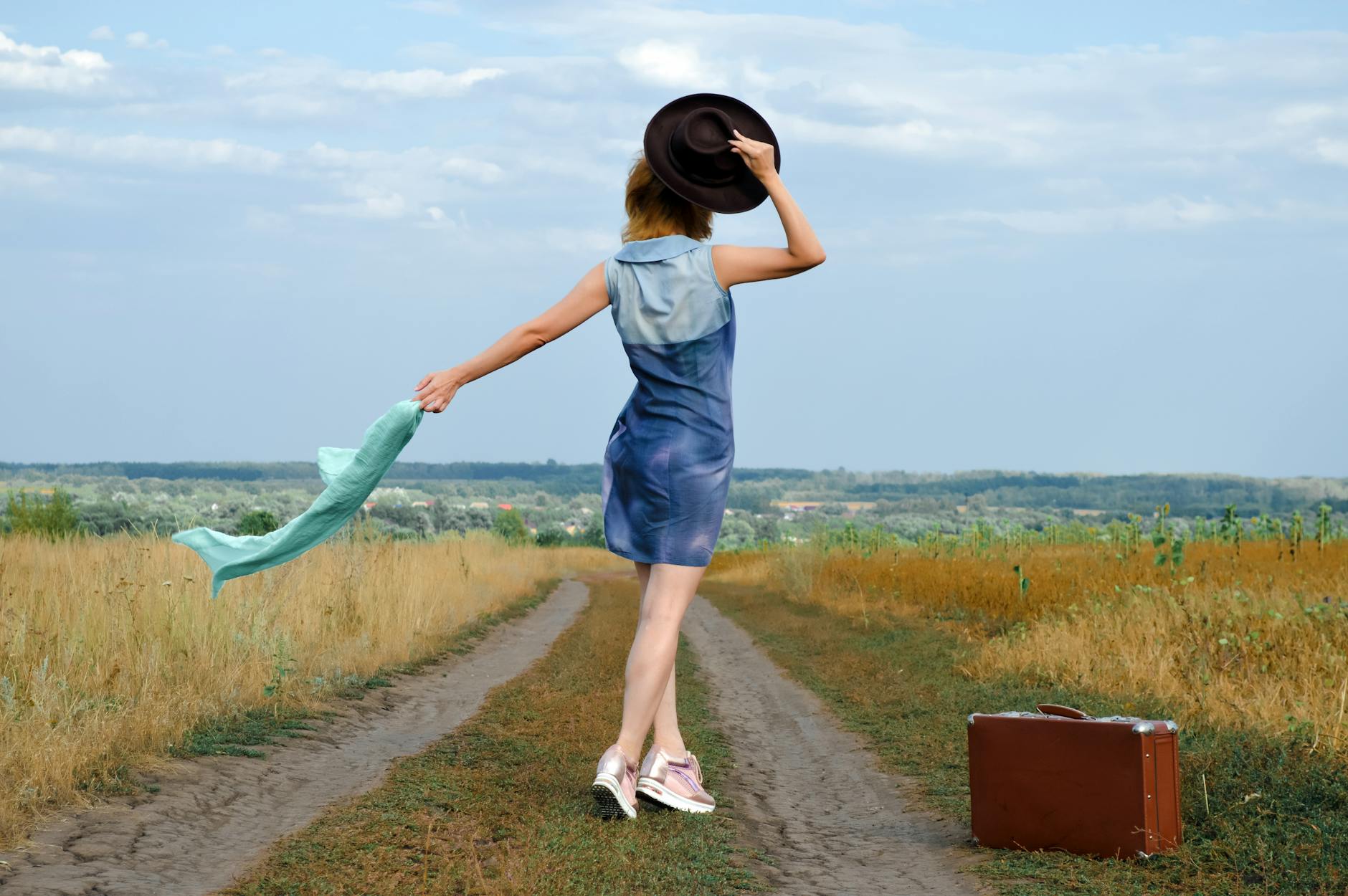 Woman stepping forward confidently on a new path representing the transformative new beginning energy of the 511 angel number