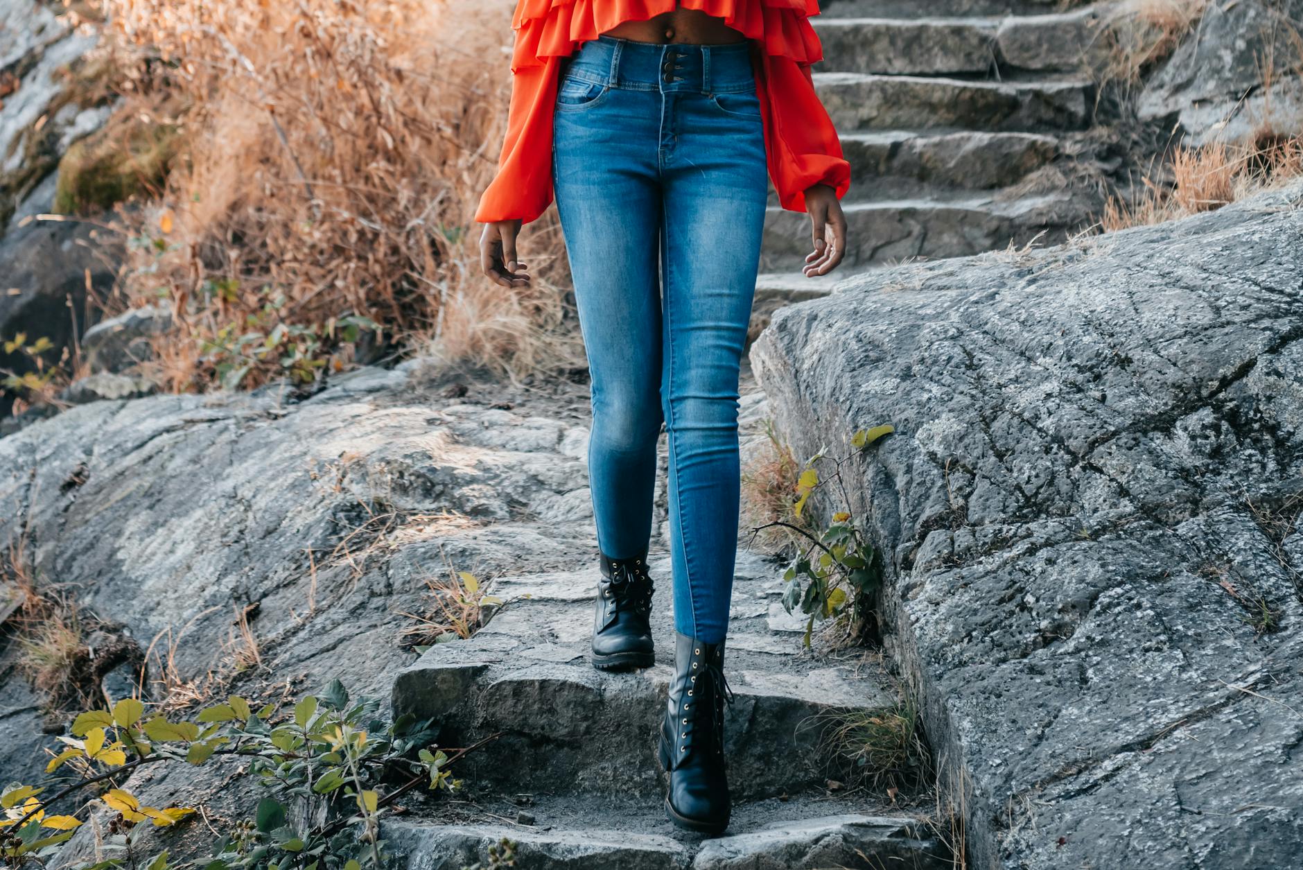 Woman stepping confidently forward on a new path representing the change and new beginning energy of the 515 angel number
