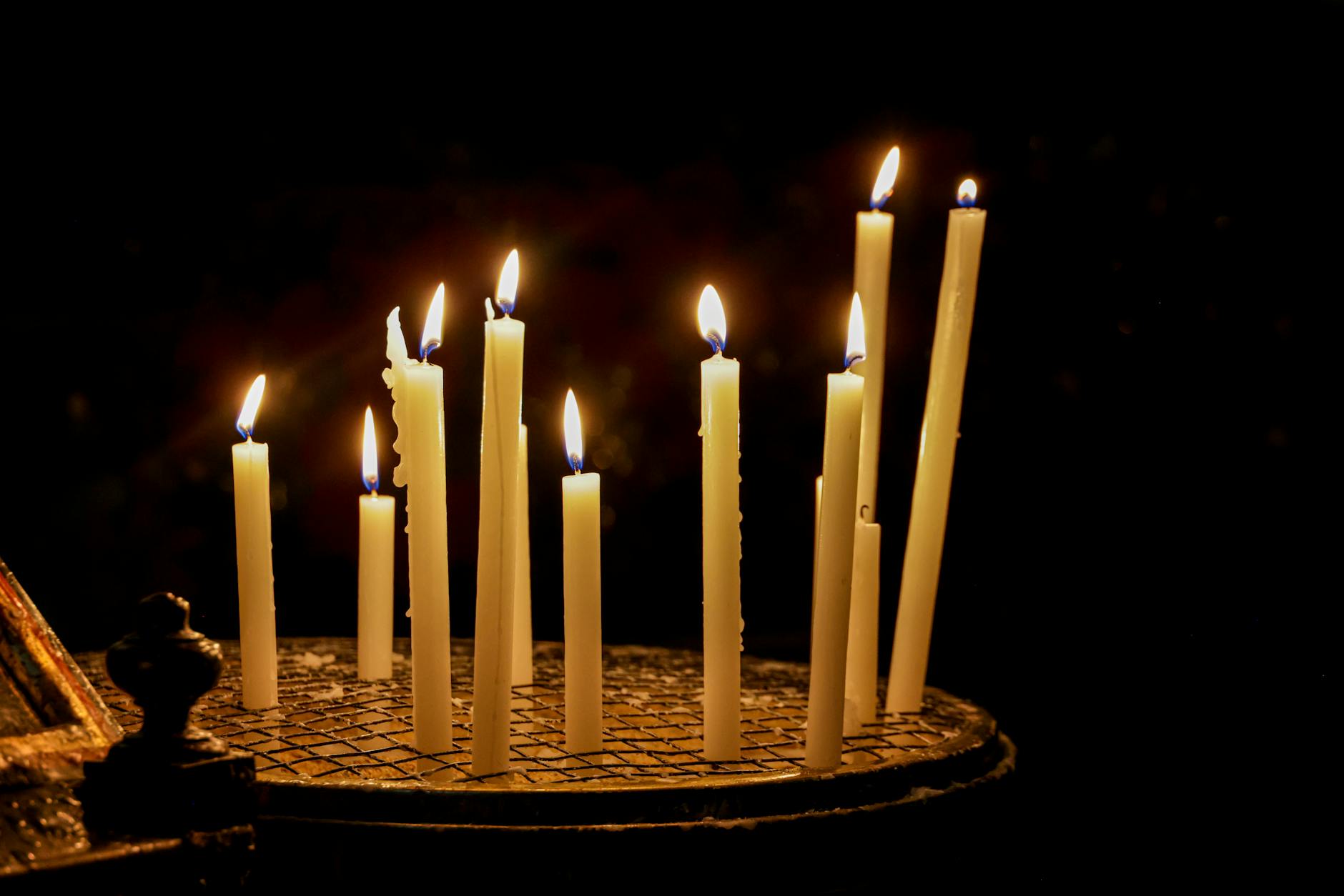 Candles burning in a quiet spiritual space — representing the contemplative wisdom and sacred transition energy of angel number 755