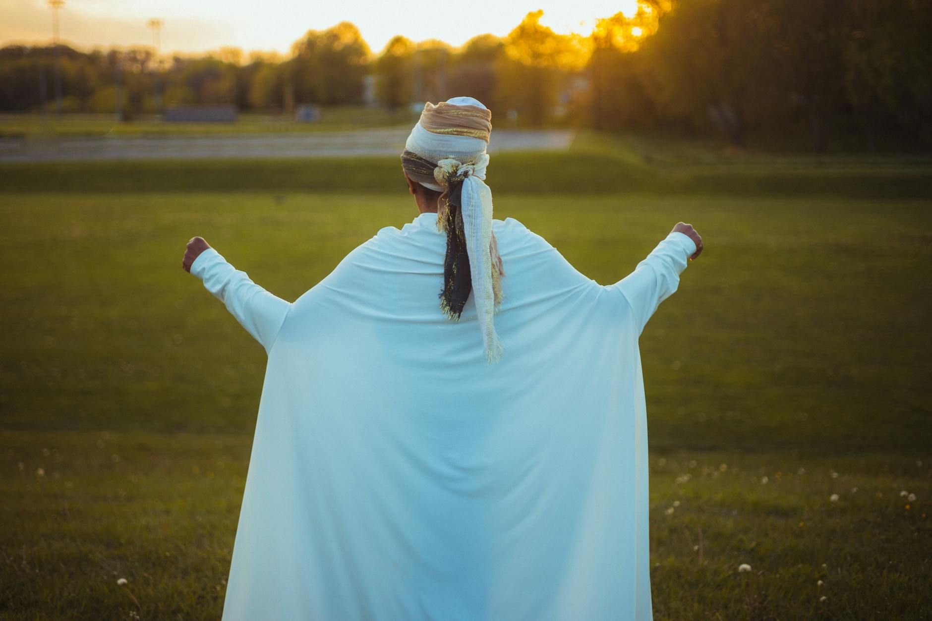 Woman standing at the threshold of a new path releasing the past representing the completion and new beginning energy of the 919 angel number