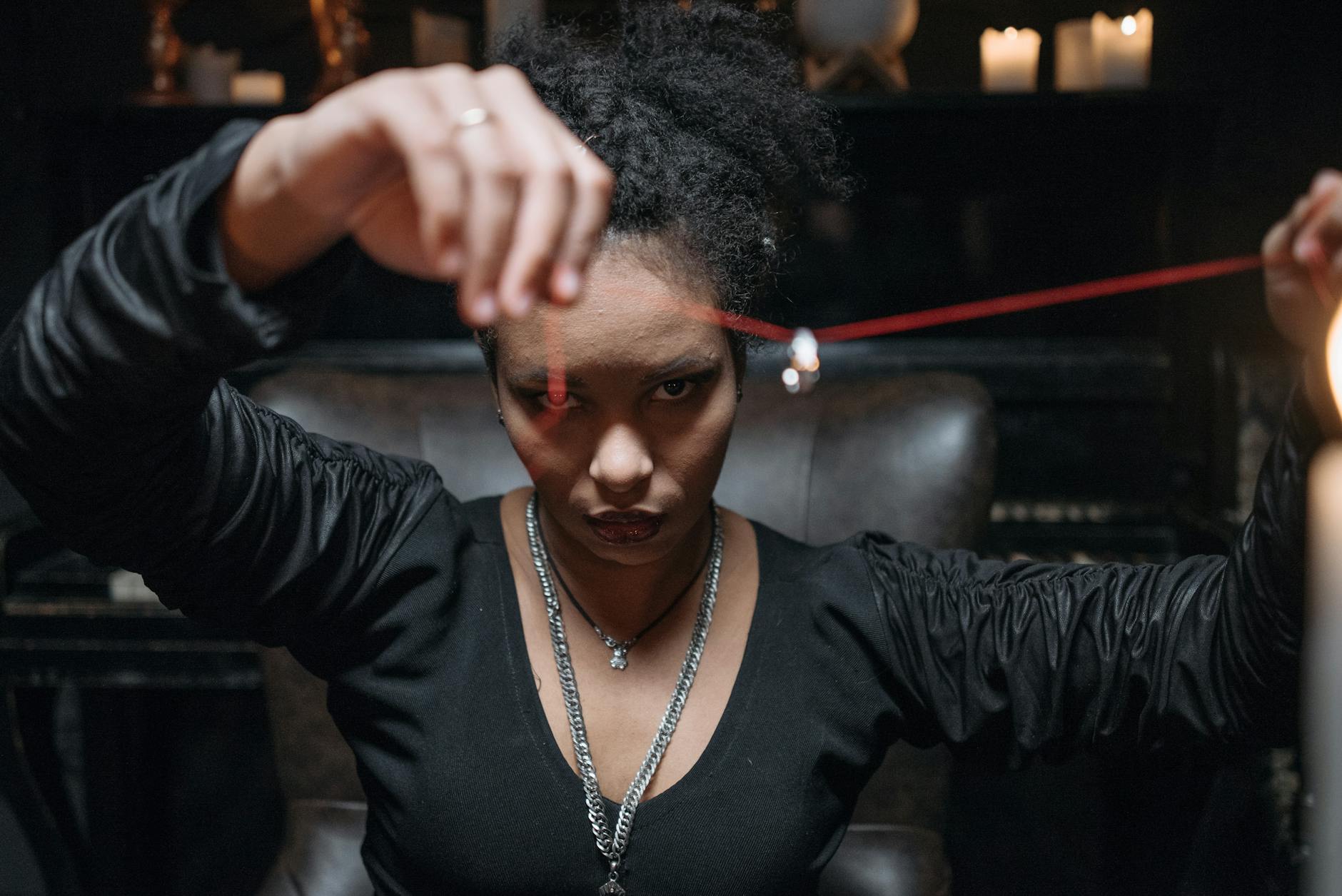 Woman wearing a delicate gold angel number necklace as a symbol of spiritual connection and intention